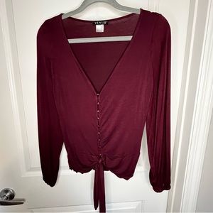 Venus burgundy top size Small, waist length, Vneck, button and tie details.